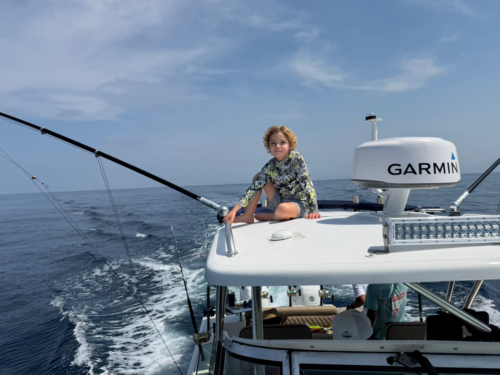 Young angler on the tower with Garmin radar